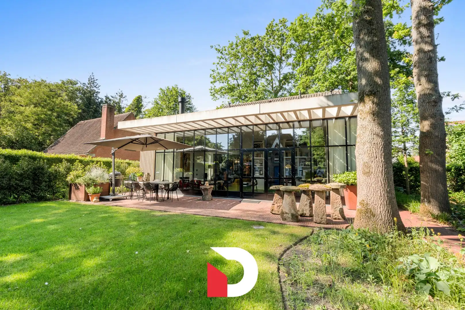 Stijlvolle en duurzame villa met unieke tuin nabij Brugge foto 4