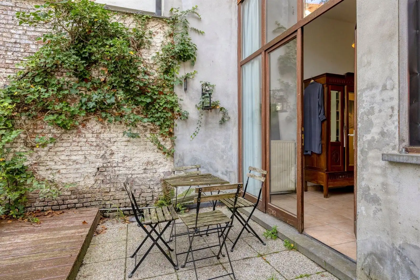 Instapklaar 1-slpk appartement met tuin foto 14