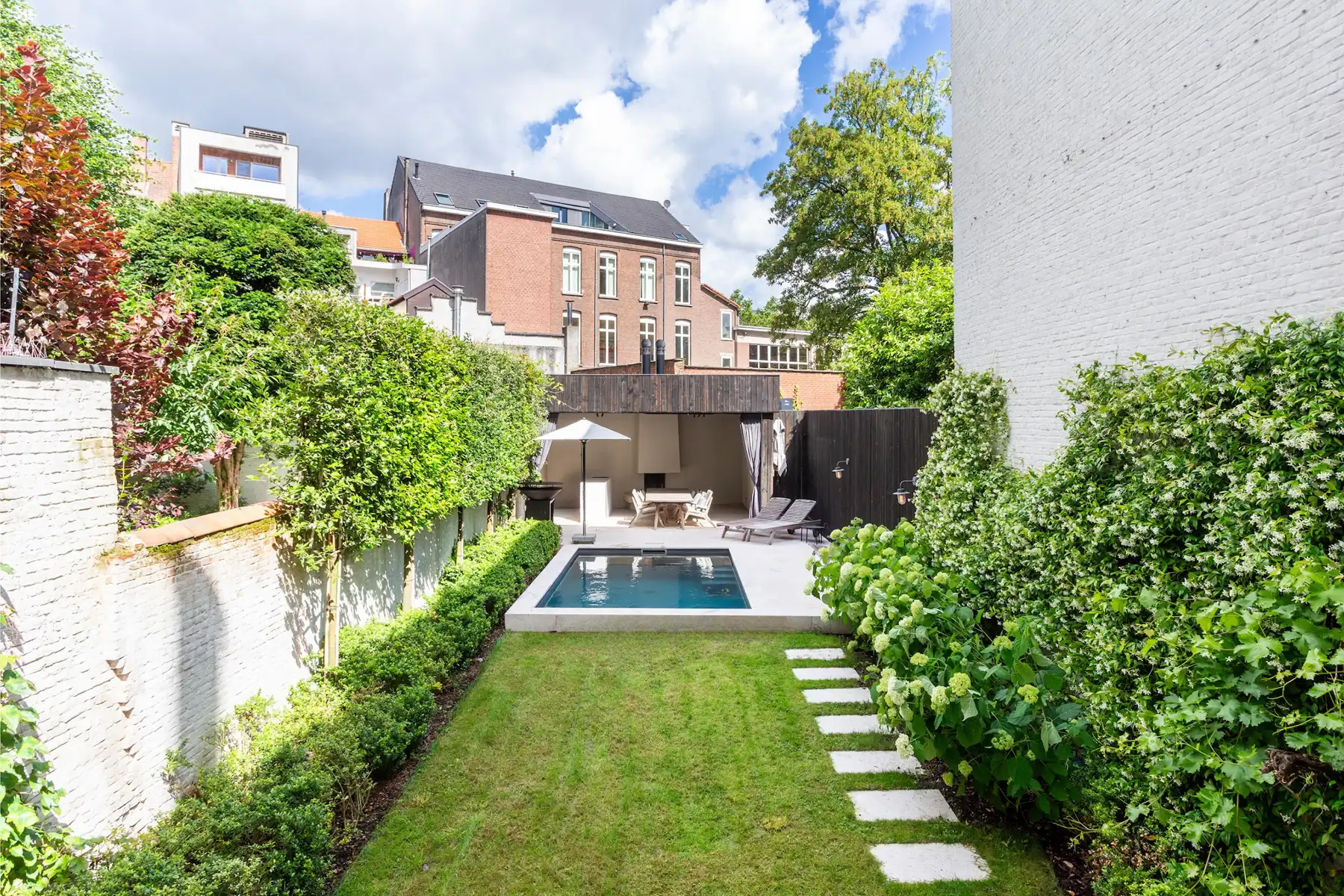 Luxueus gelijkvloers appartement met tuin en zwembad foto 13