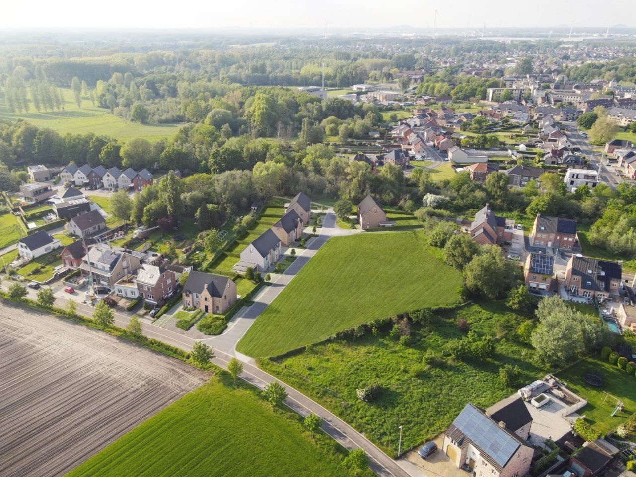 Bouwgrond van 5a68ca in Bilzen - Allure foto {{pictureIndex}}
