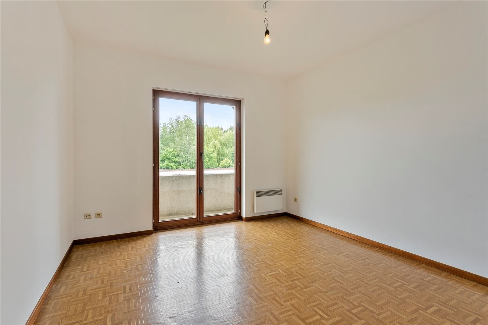 Appartement met terras en bijhorende garagebox foto 6
