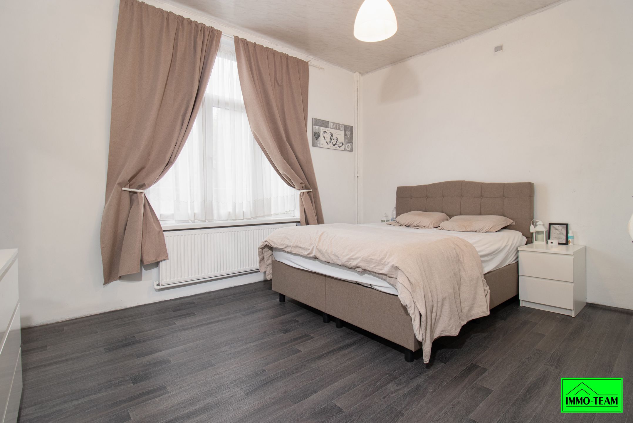 Opbrengsteigendom met handelszaak en 2 duplexappartementen foto 13