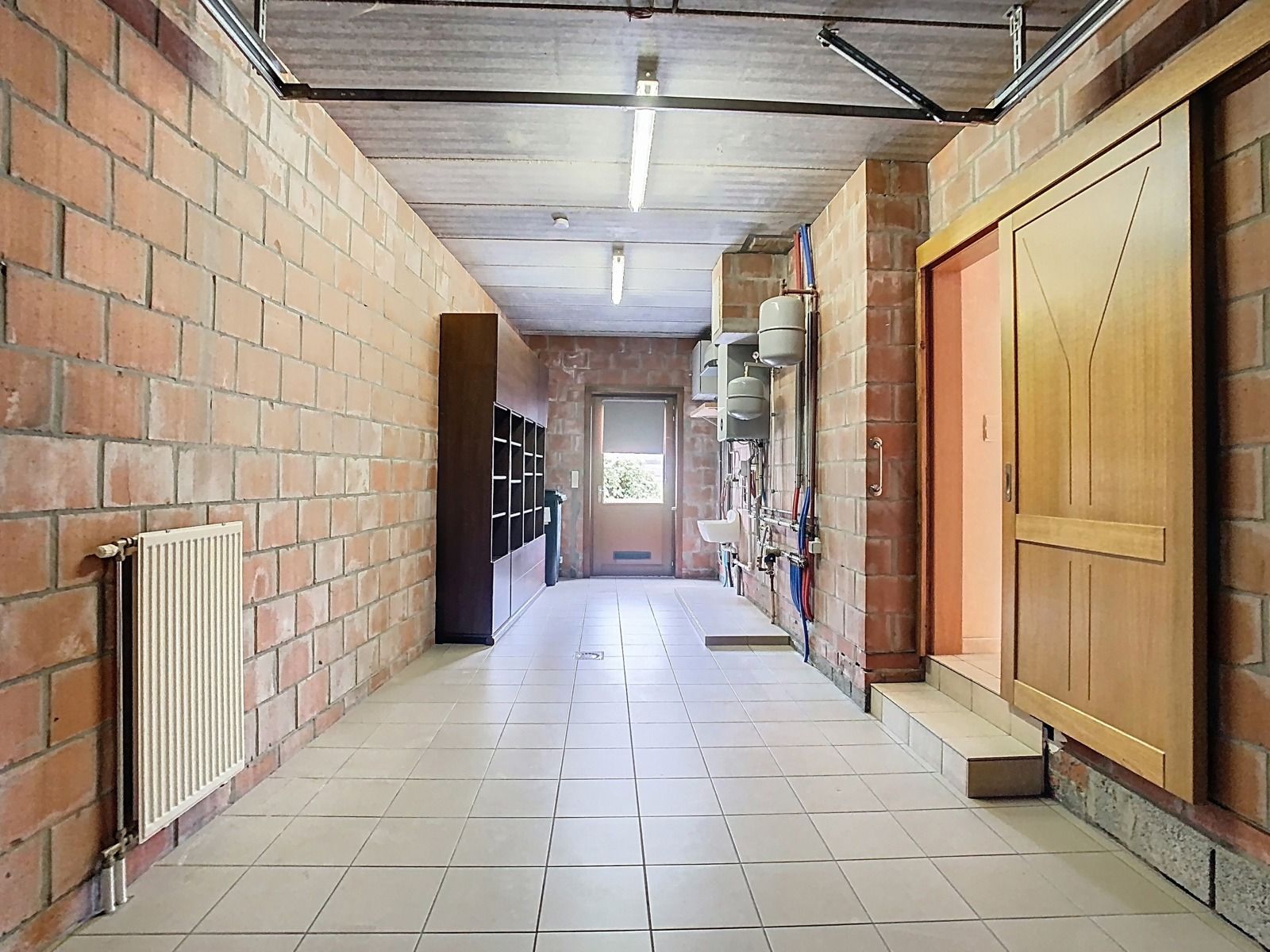 Instapklare woning met 3 SLPK, 2 badkamers, Garage én Tuin! foto 17