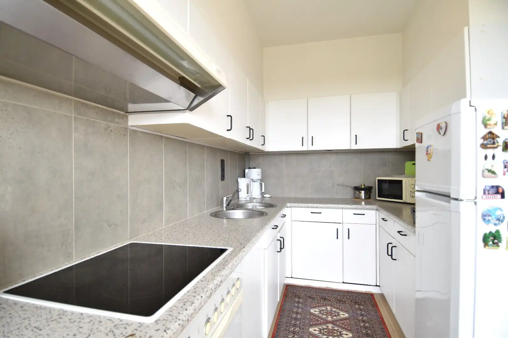 Instapklaar 2-slaapkamerappartement te koop op toplocatie in het hart van Gullegem foto 2
