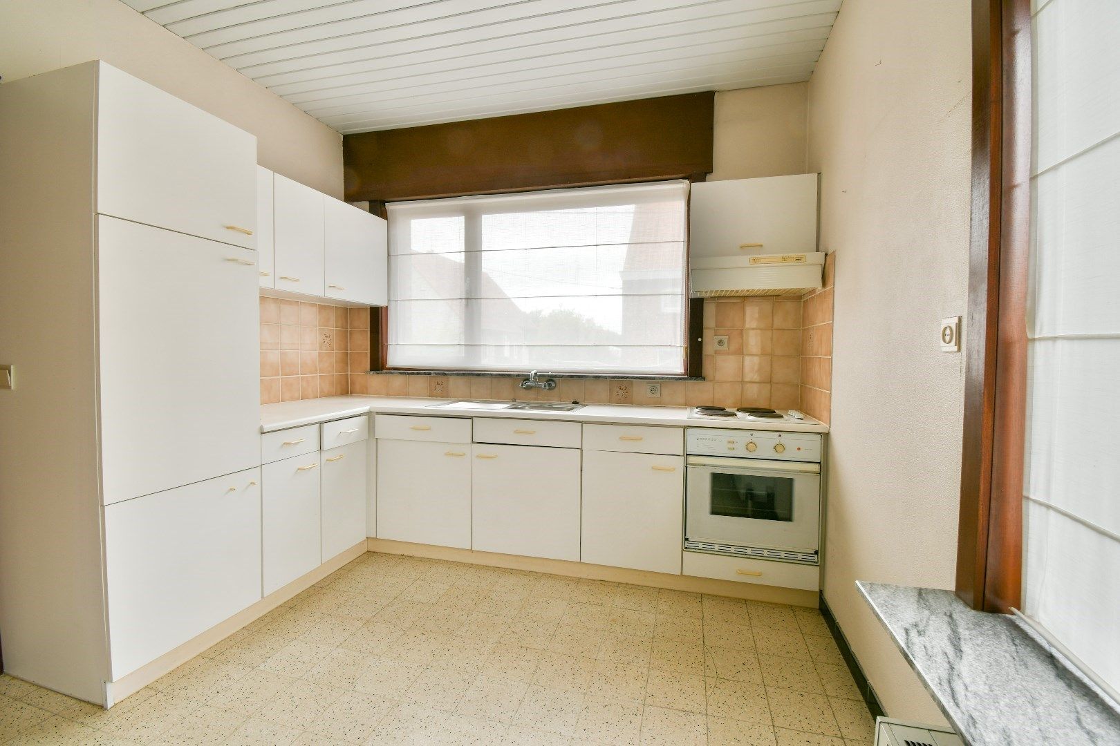 Halfopen bebouwing met renovatiepotentieel! foto 4