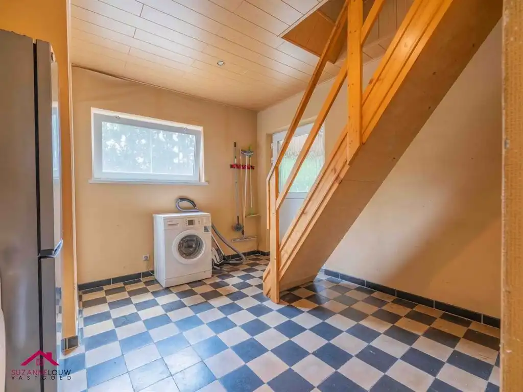 Halfopen bebouwing met kelderverdieping en ruime tuin foto 17