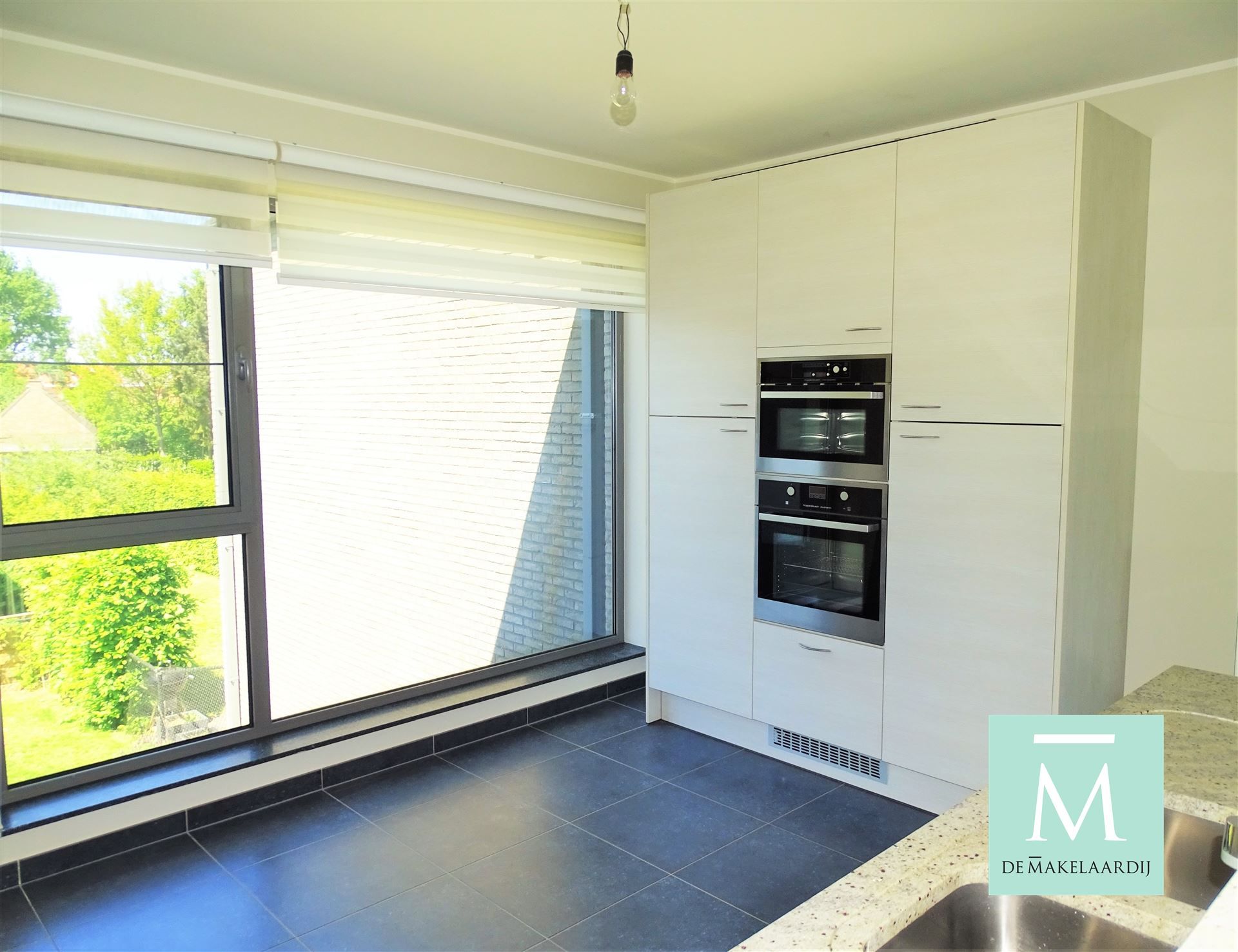 Instapklaar luxeappartement met 3 slaapkamers en dubbele garagebox. foto 4