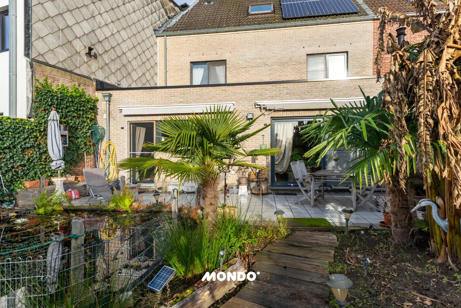 Ruime gezinswoning 4 slaapkamers met tuin, vijver en garage foto 23