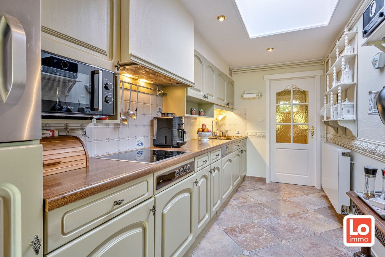 Charmante halfopen woning met inpandige garage op een rustige en groene locatie in Beervelde! foto 10