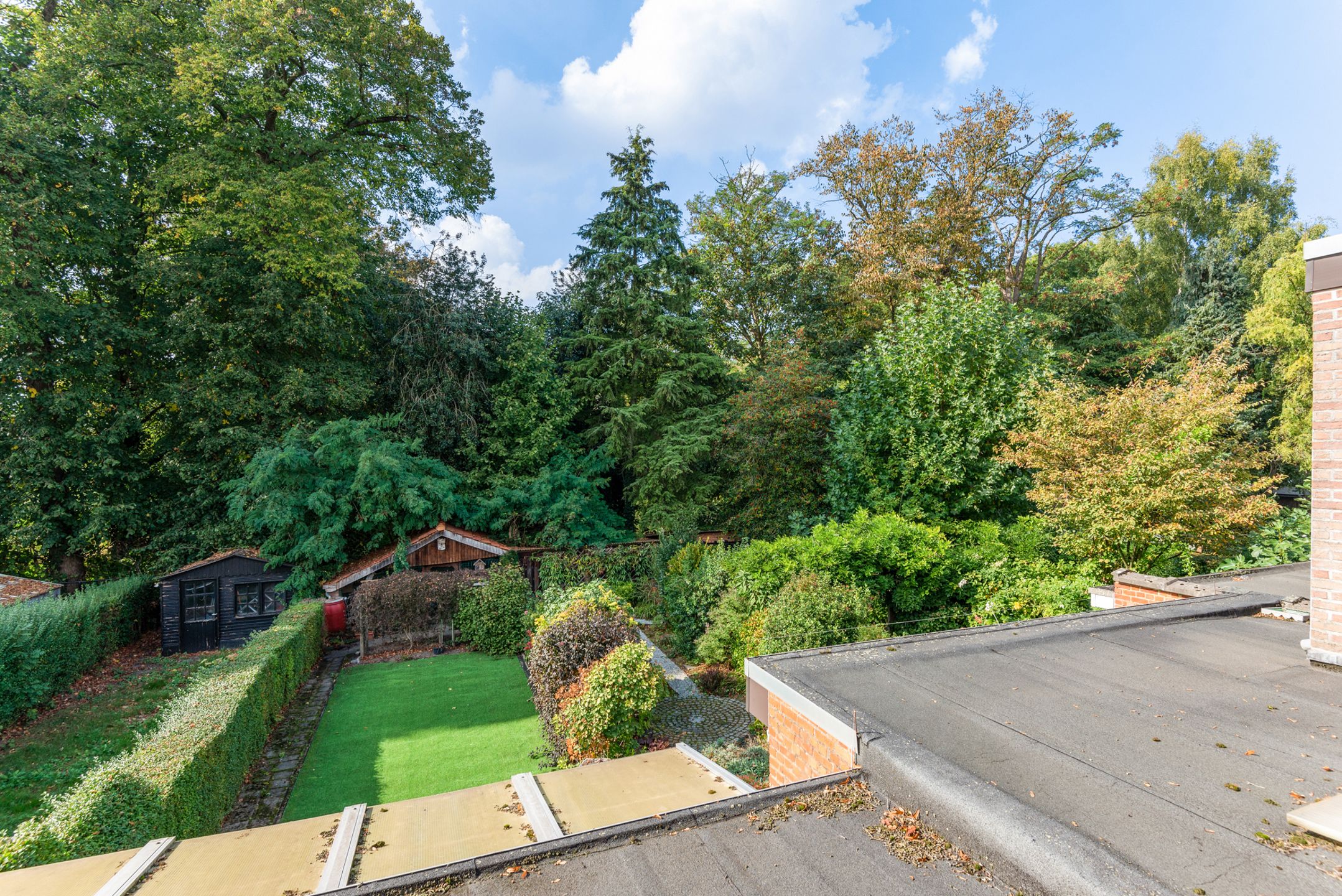 Mooie woning met appartement op toplocatie - mooie tuin foto 16