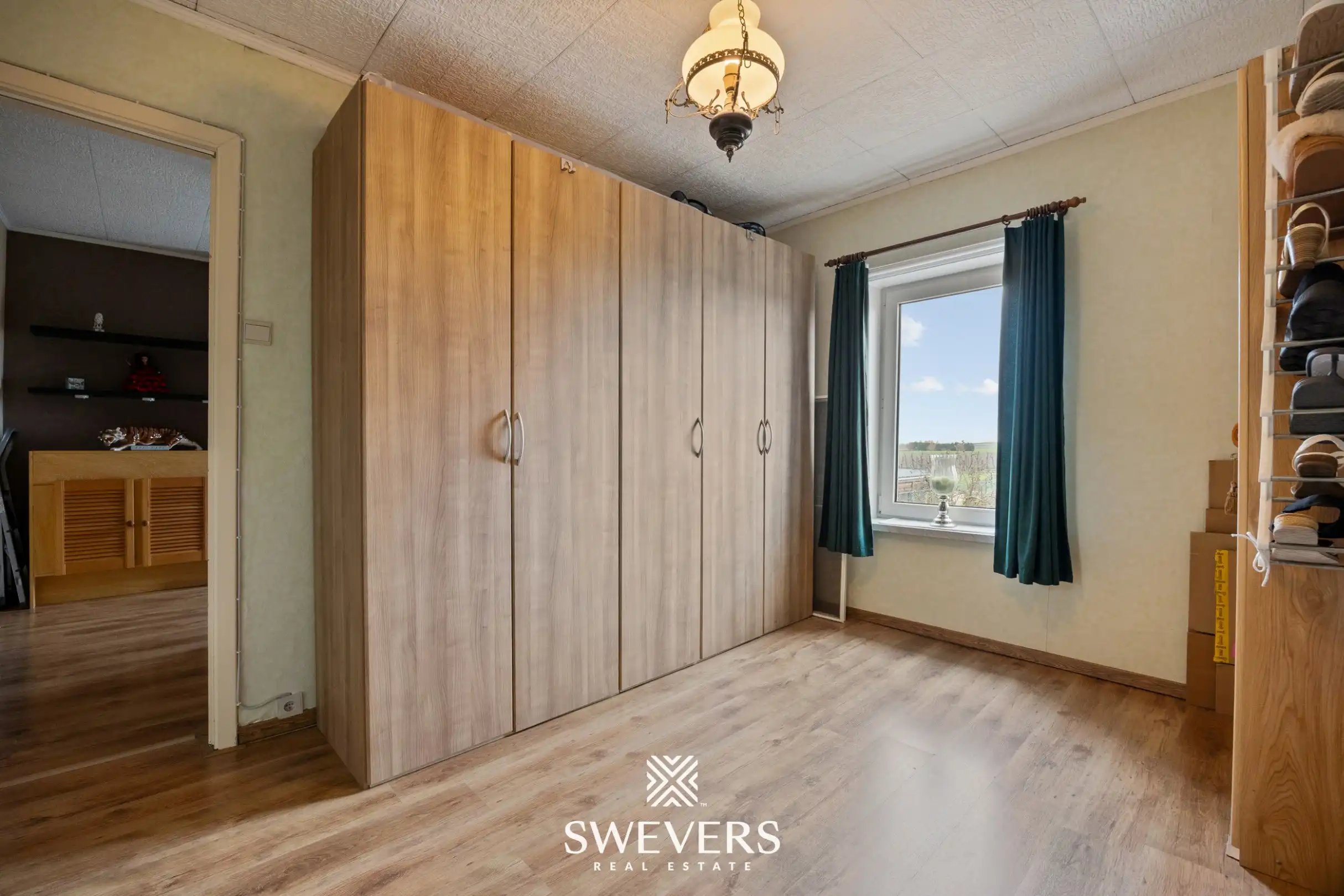 Ruime gezinswoning met 4 slaapkamers, inpandige garage en een ruime tuin foto 21