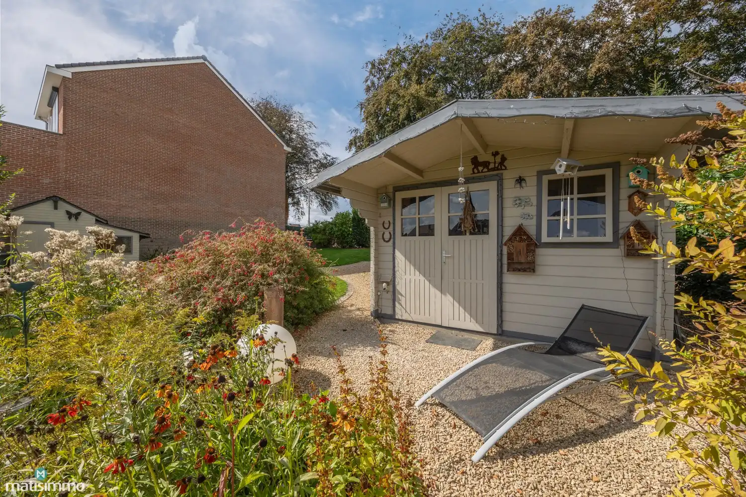 INSTAPKLAAR GERENOVEERDE WONING MET 3 SLAAPKAMERS, GARAGE, CARPORT EN PRACHTIGE TUIN NABIJ HET KANAAL EN DE MAAS IN LANAKEN foto 35