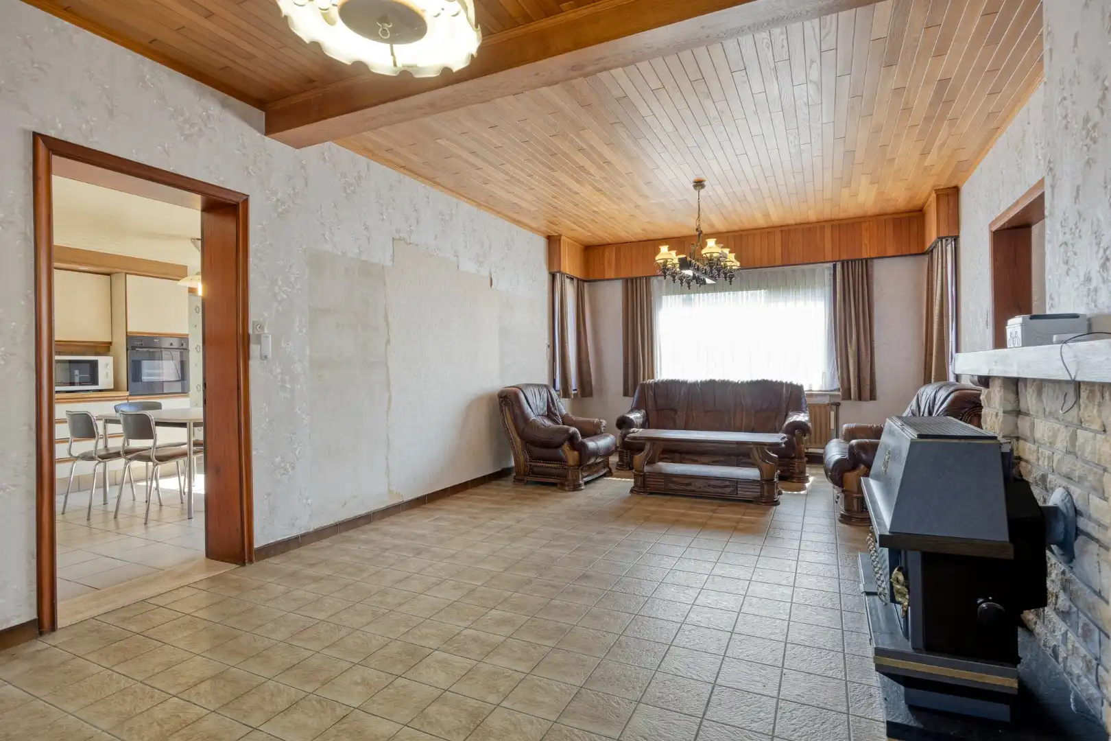 Ruime te renoveren woning met uitbreidingspotentieel en zonnig perceel van 1.738 m² !  foto 6