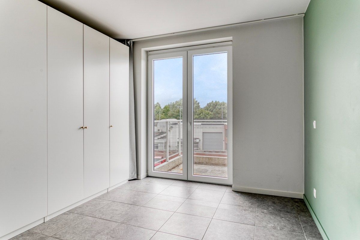 Dit modern afgewerkt appartement bevindt zich op de tweede verdieping van een recente residentie. foto 7