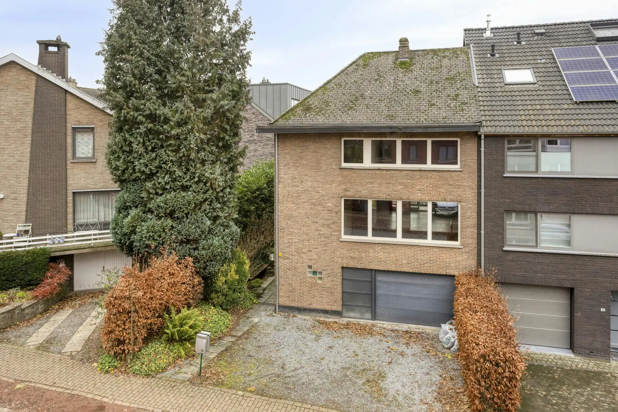 Driegevelwoning met extra studio/kantoor of praktijk, op een toplocatie in het centrum van Grimbergen! foto 25
