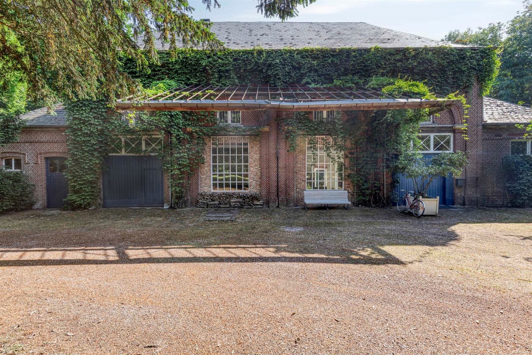 Uitzonderlijk koetshuis op kasteeldomein in Hansbeke, 487m² puur woongenot foto 4