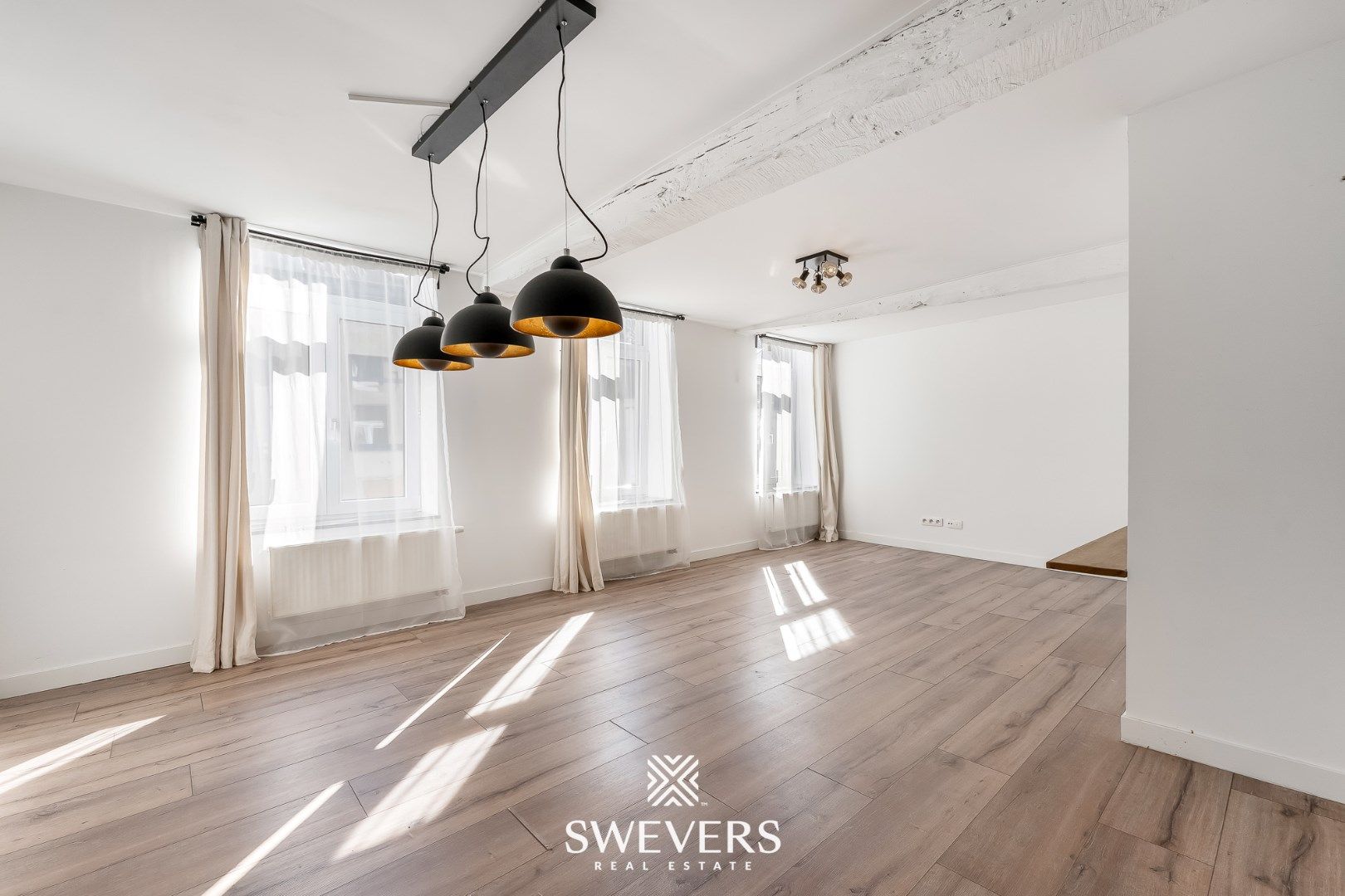 Ruim duplex appartement met knusse stadstuin in hartje Borgloon foto 4