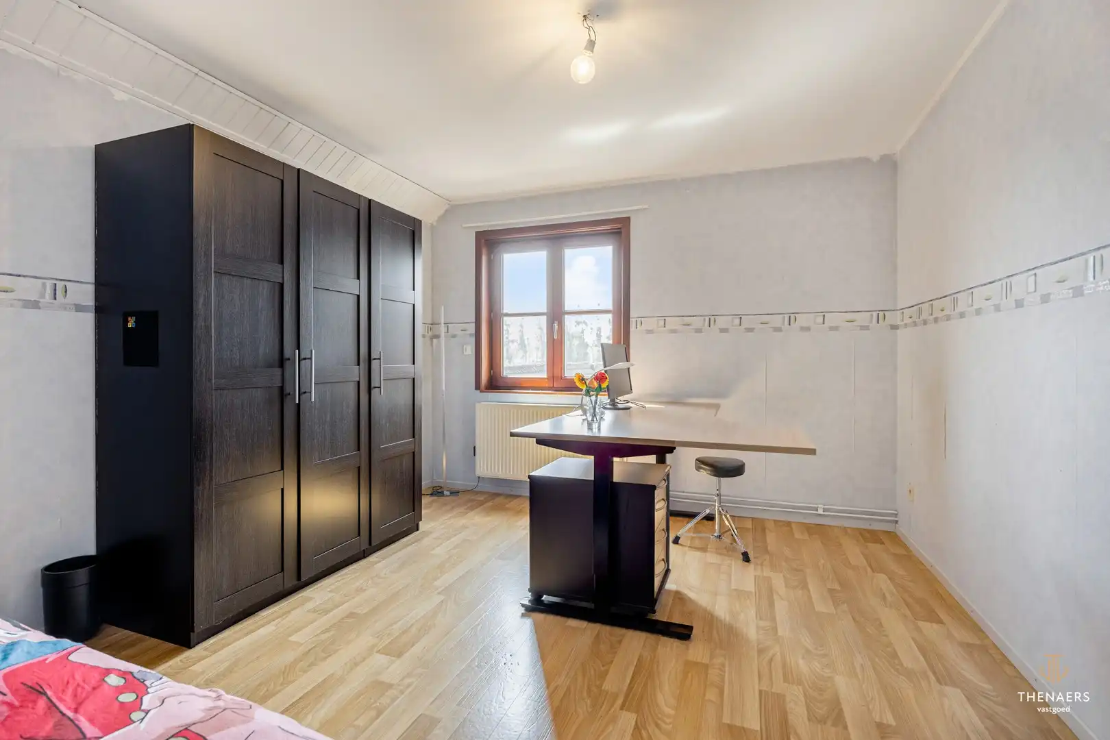 Ruime halfopen woning met 3 slaapkamers en prachtige tuin. foto 15