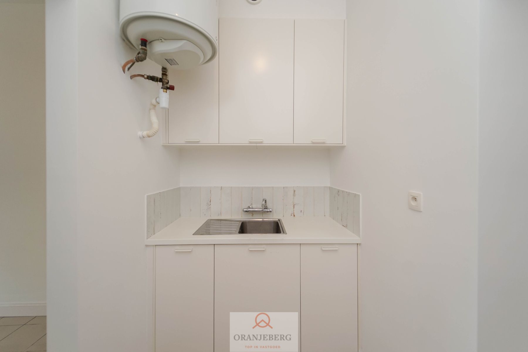 Appartement op het gelijkvloers met koertje (18 m²) te Rooigemlaan ! foto 6