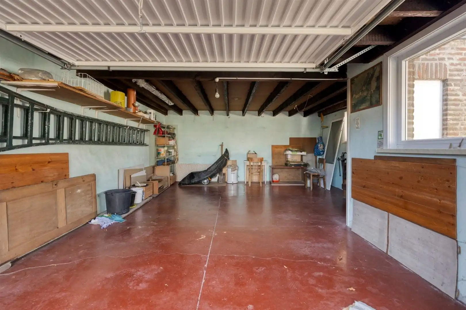 Rustig gelegen open bebouwing met grote garage en 3 slaapkamers op een perceel van 500 m². foto 16