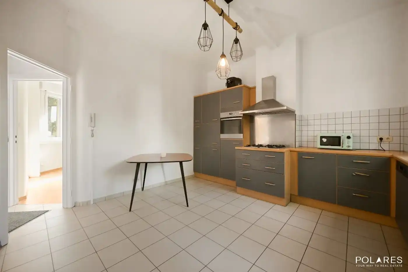 Gelijkvloers appartement met prachtige tuin én polyvalent bijgebouw! foto 7