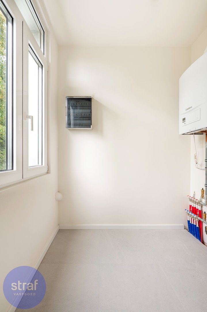 Gerenoveerd appartement met dakterras op de Sint-Andriesplaats. foto 11