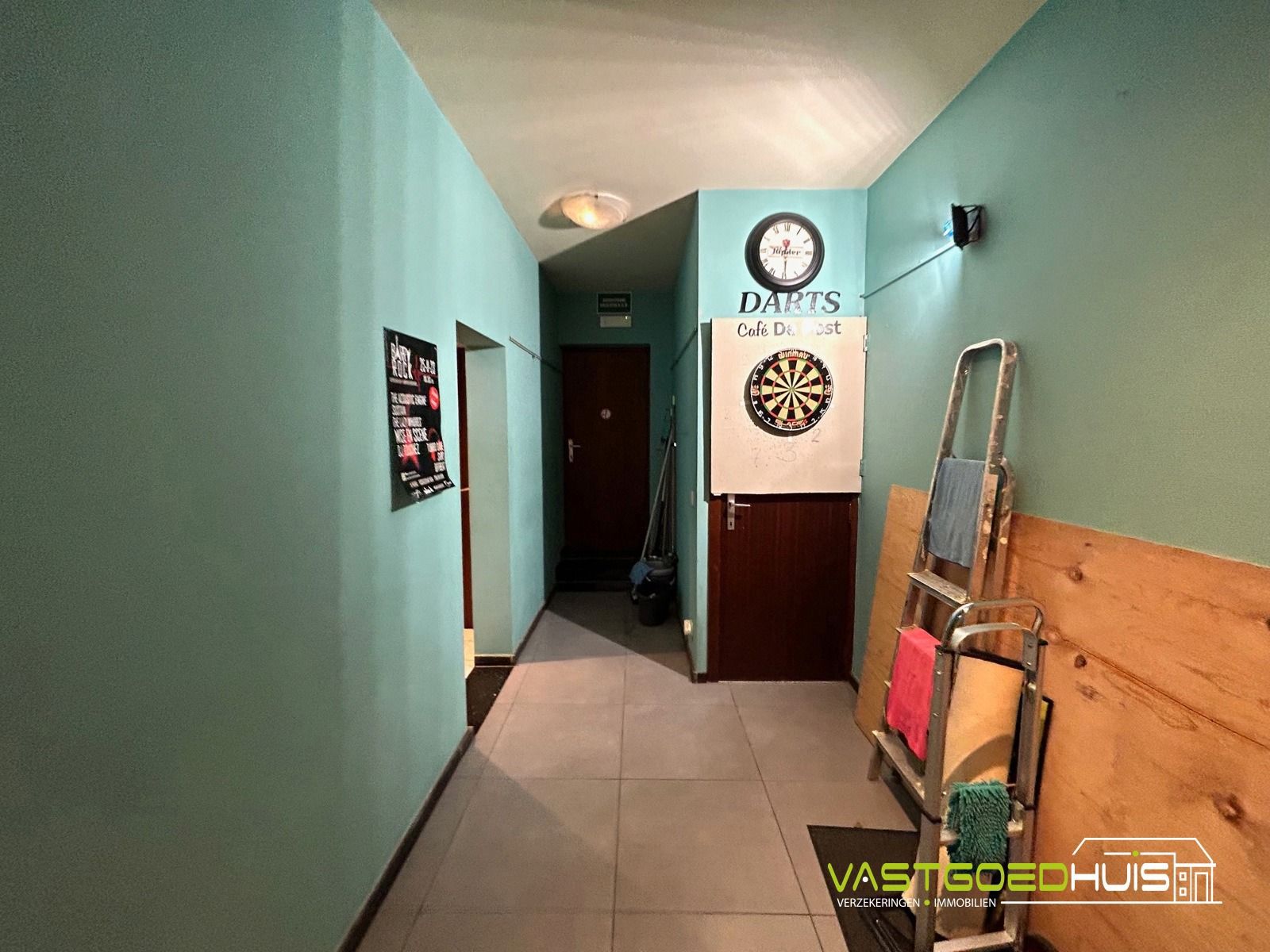 Opbrengsteigendom: handelspand, 2 appartementen en 2 garages foto 12