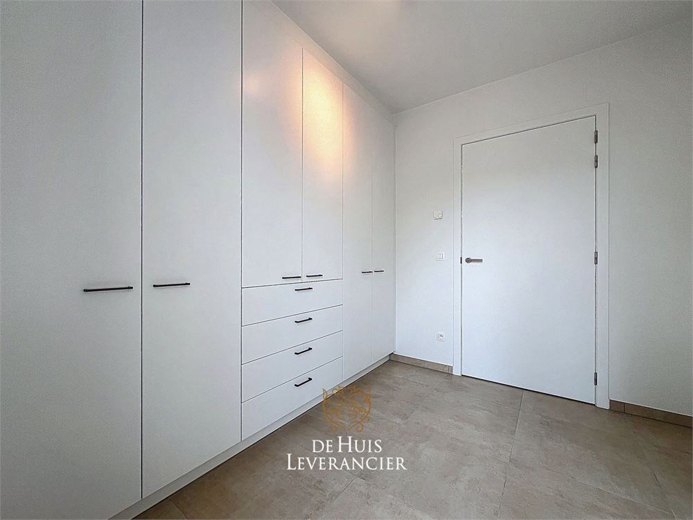 Discrete luxe & tijdloze elegantie : subliem nieuwbouwappartement met terras en gemeenschappelijk tuin te koop in Boechout foto 16