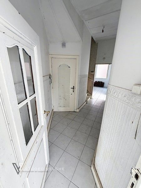 Te renoveren handelspand met duplex appartement op zichtlocatie foto 5