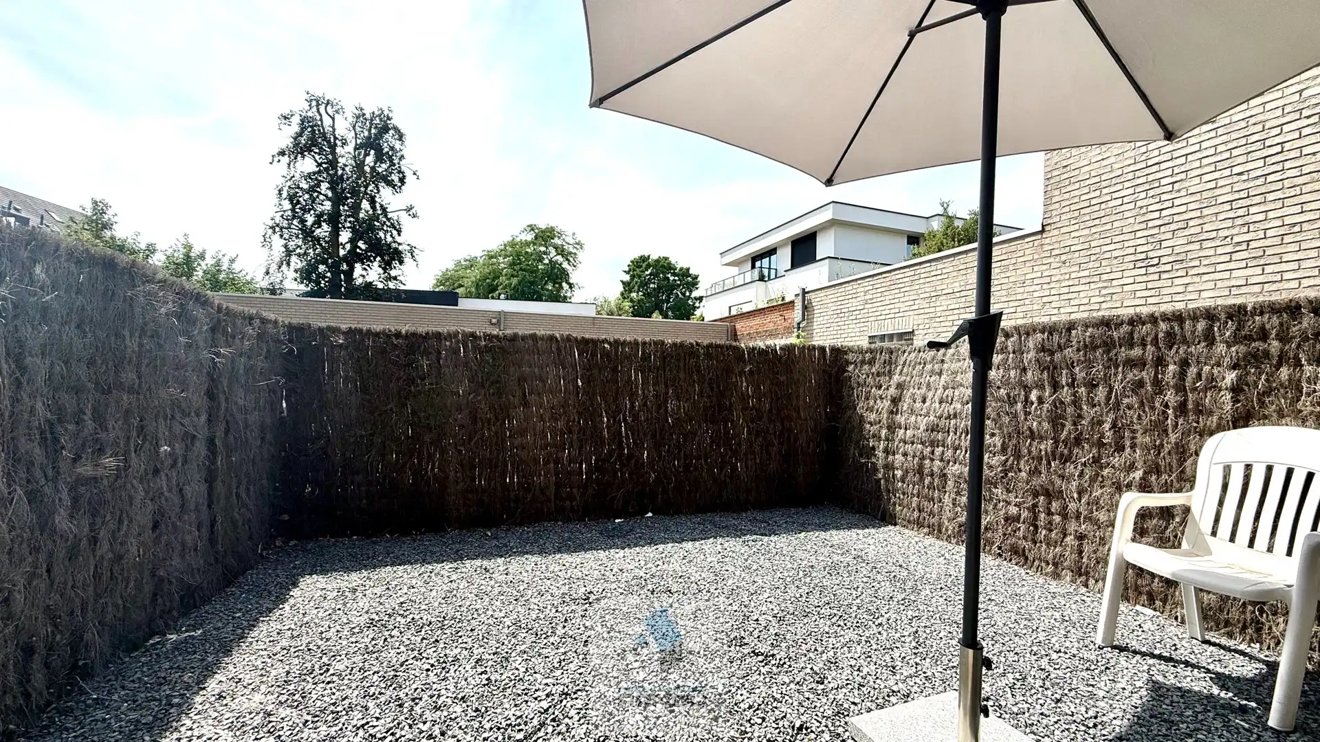 Gezellig gelijkvloers appartement met 1 slaapkamer, stadstuintje en privatieve autostaanplaats foto 13