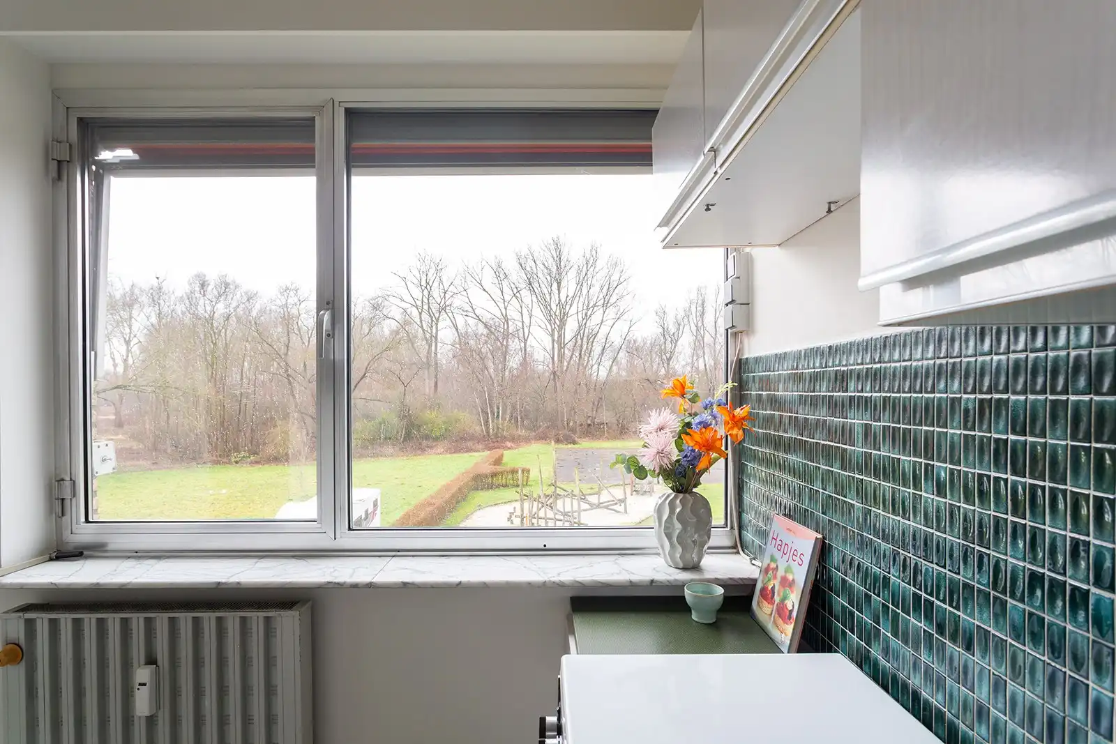 Appartement met 2 slpk., garage en rustgevend groen uitzicht foto 10