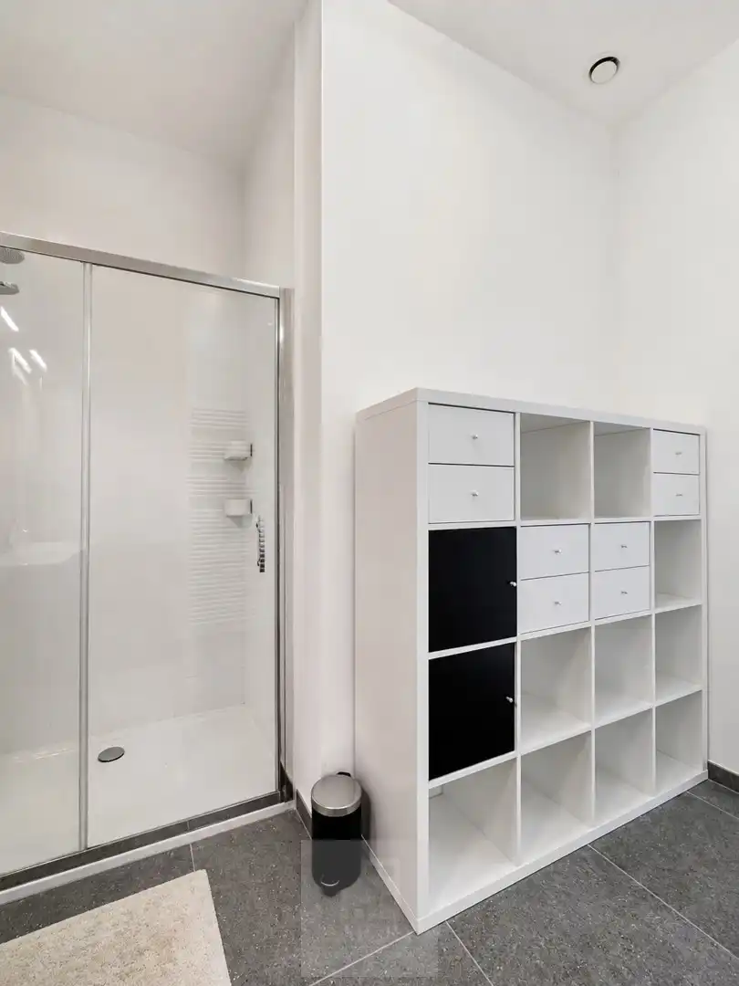 Recent gelijkvloers 2-slaapkamerappartement met tuin aan de Leieboorden foto 14