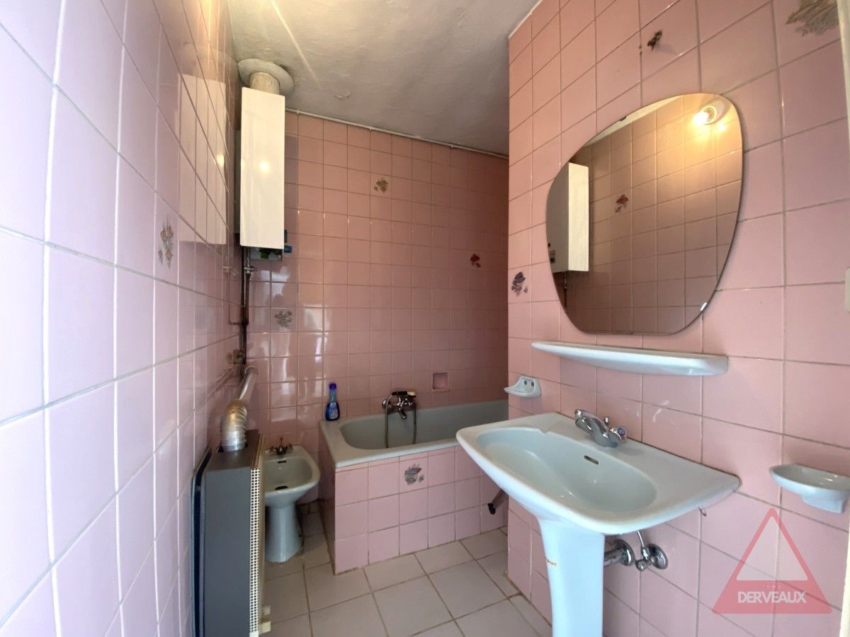 Passendale – Te renoveren woning met tuin, garage en vaste trap naar zolder foto 8