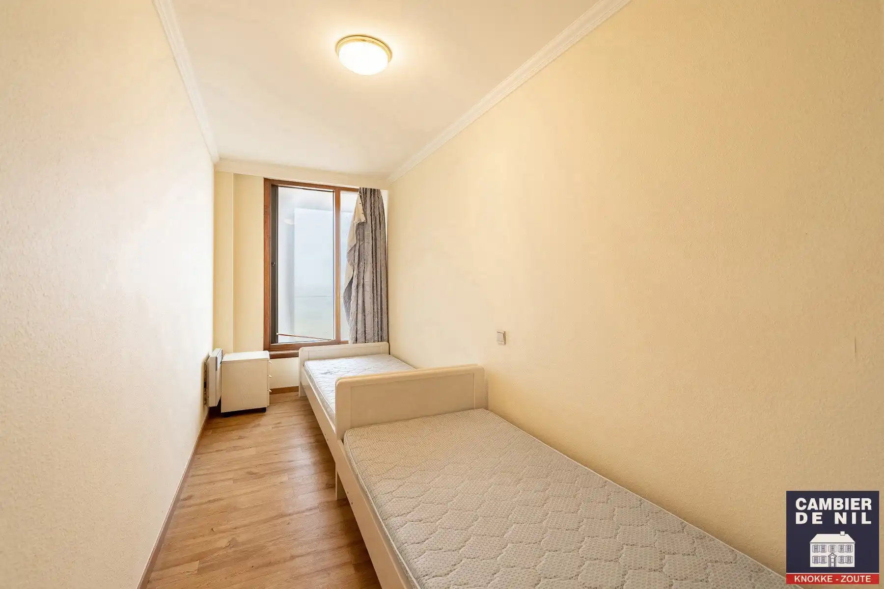 Gemeubeld appartement met frontaal zeezicht aan het Vanbunnenplein foto 14