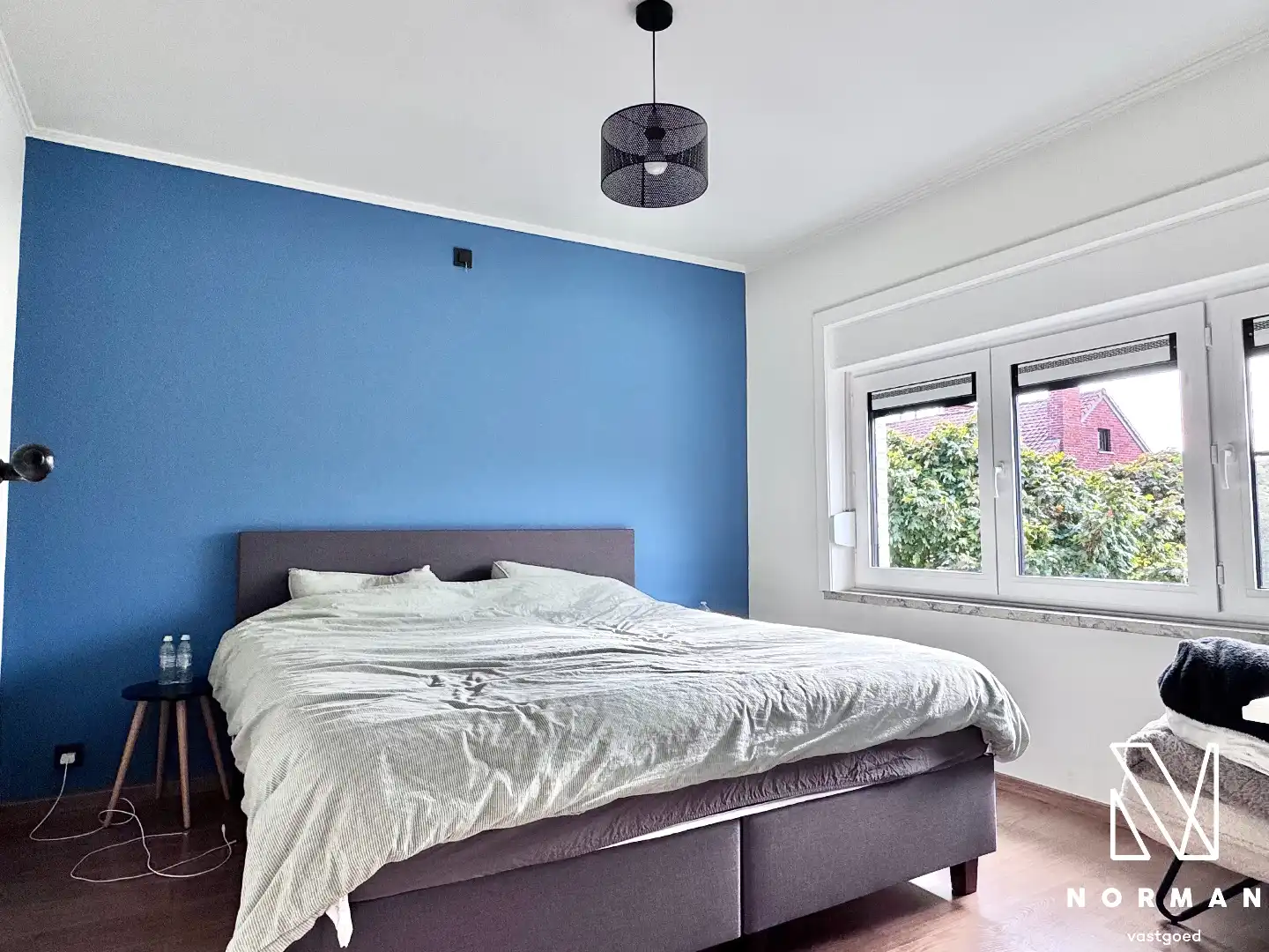 Instapklare woning te koop in rustige woonwijk te Bavikhove met tuin, garage en uitweg! foto 14