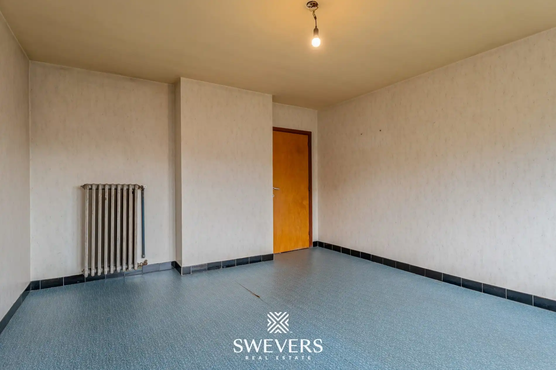 Ruime open bebouwing met potentieel en zuidgerichte tuin in rustige wijk van Houthalen foto 15