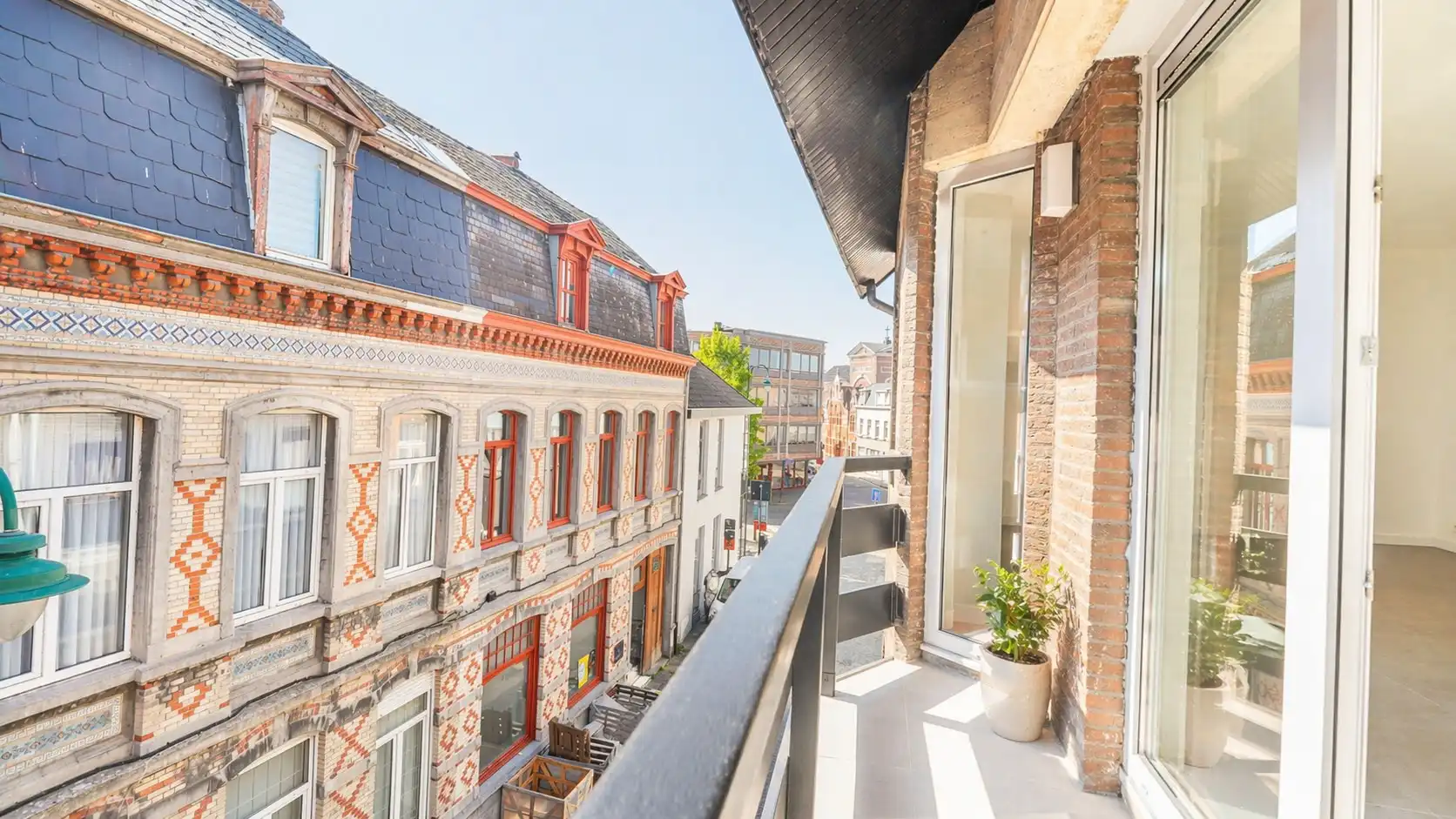 Instapklaar appartement met balkon en garagebox in het centrum van Lokeren foto 4