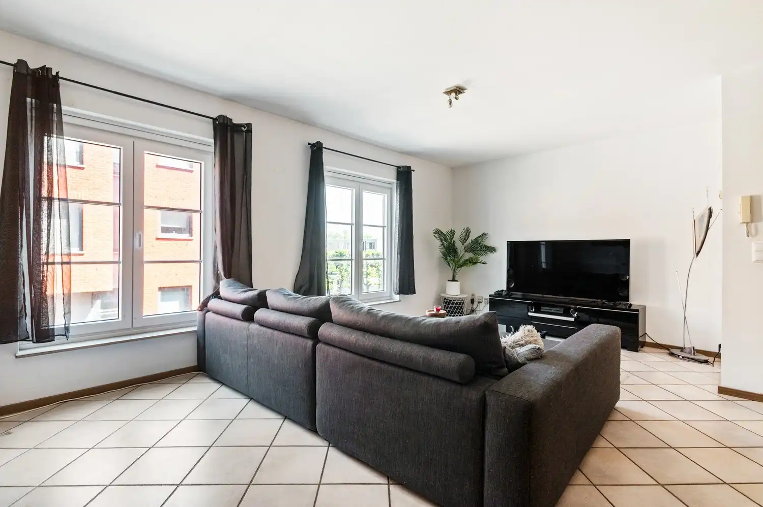 Ruim appartement (94 m²) met twee slaapkamers in het centrum van Broechem! foto 3
