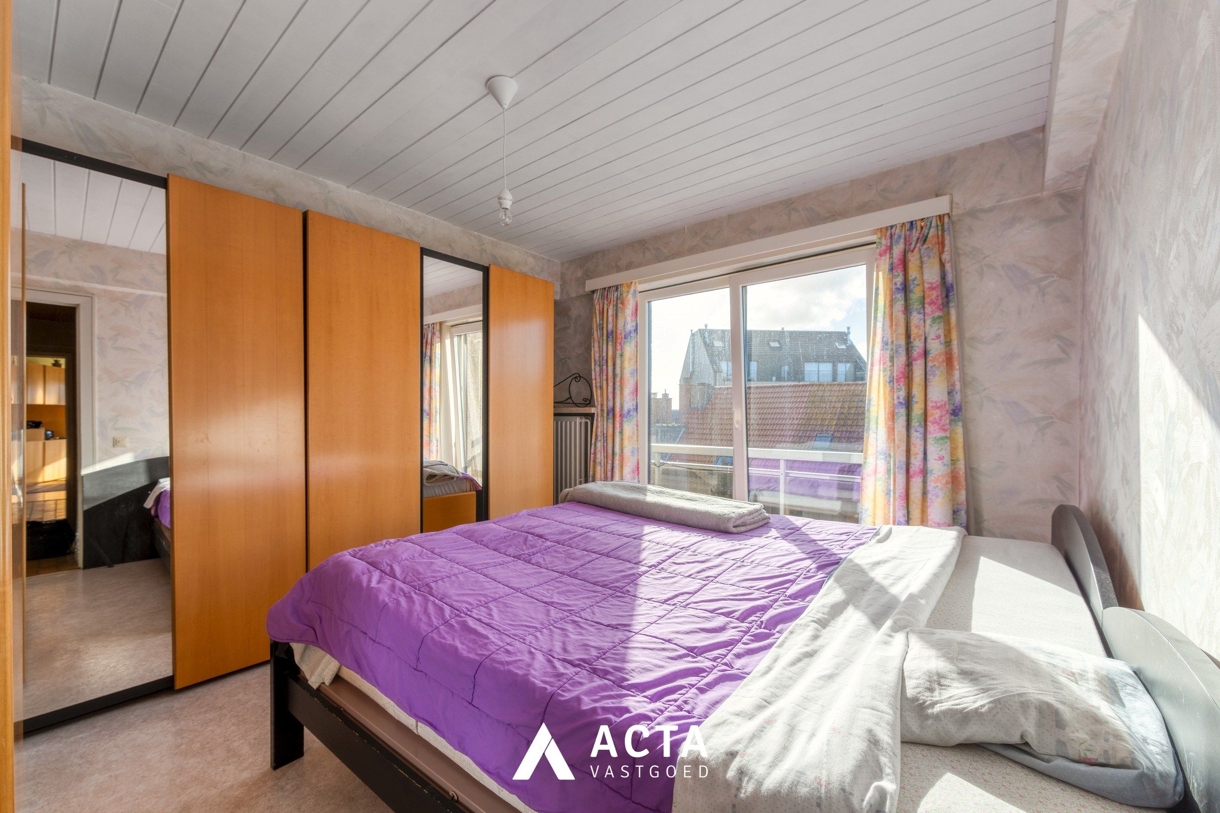 Twee-slaapkamerappartement met garagebox foto 6