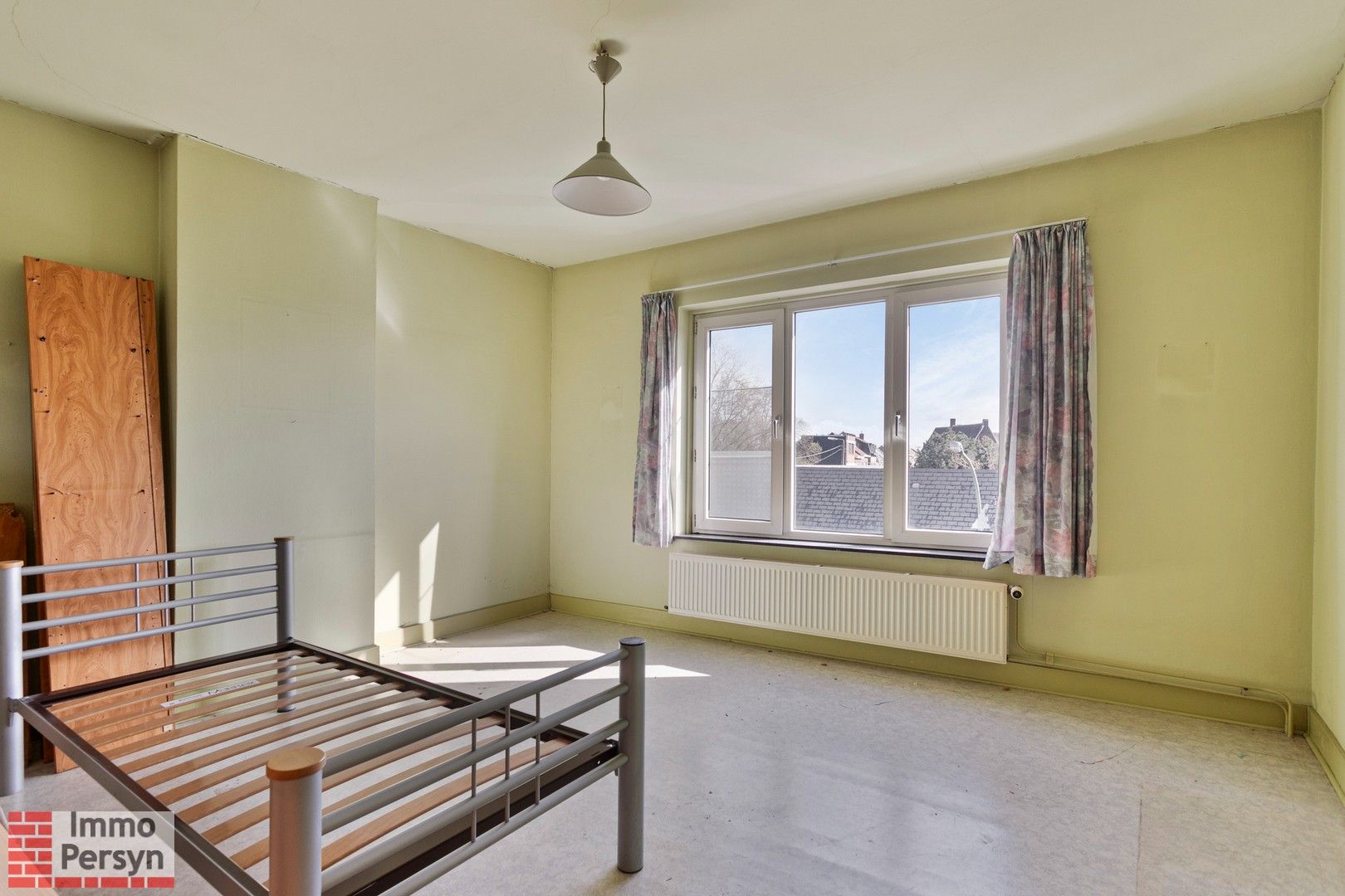 Ruime stadswoning met 3 slaapkamers en tuintje. foto 12