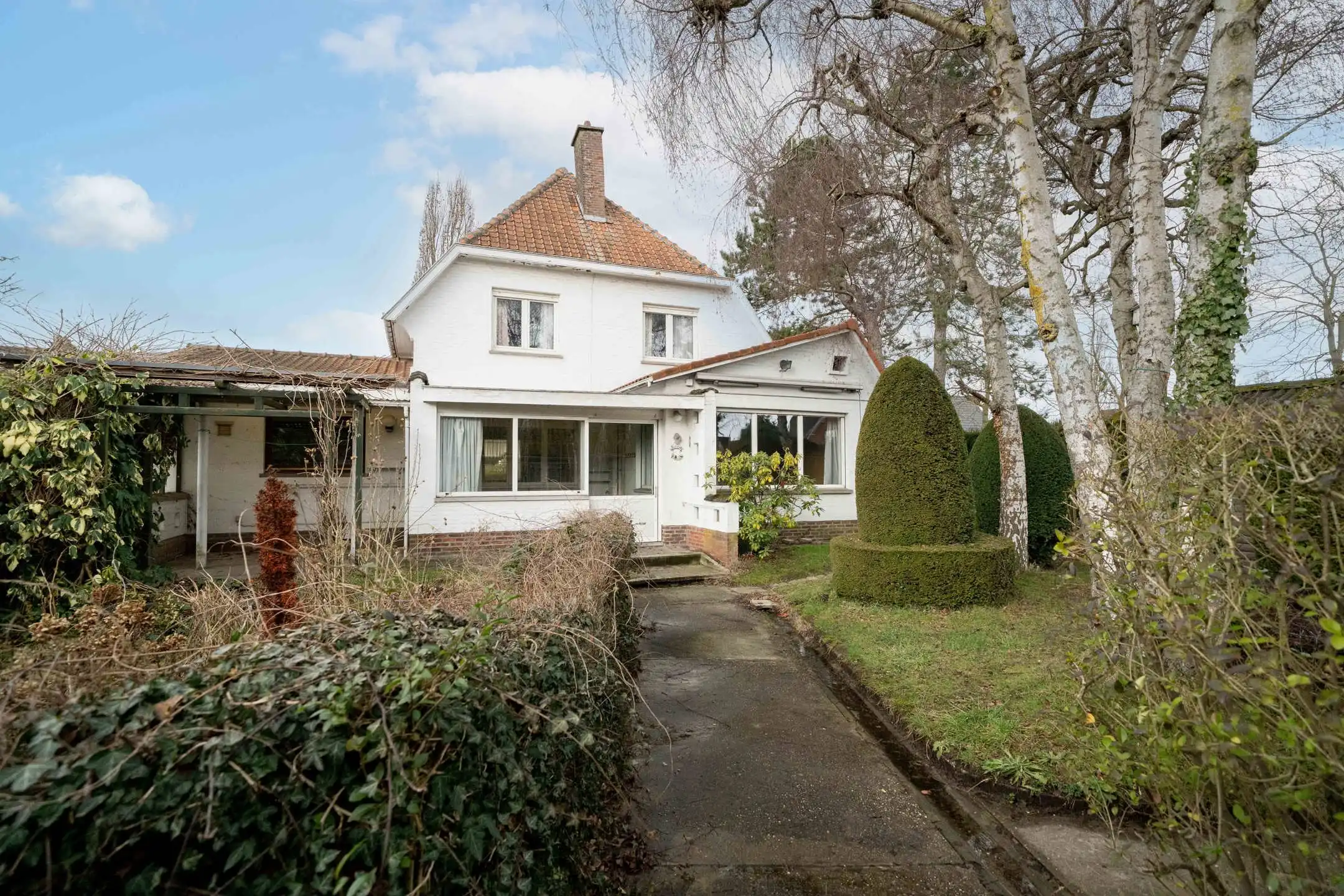 Woning op een ruim hoekperceel van 7a25ca in rustige woonwijk te Sint-Katelijne-Waver foto 4