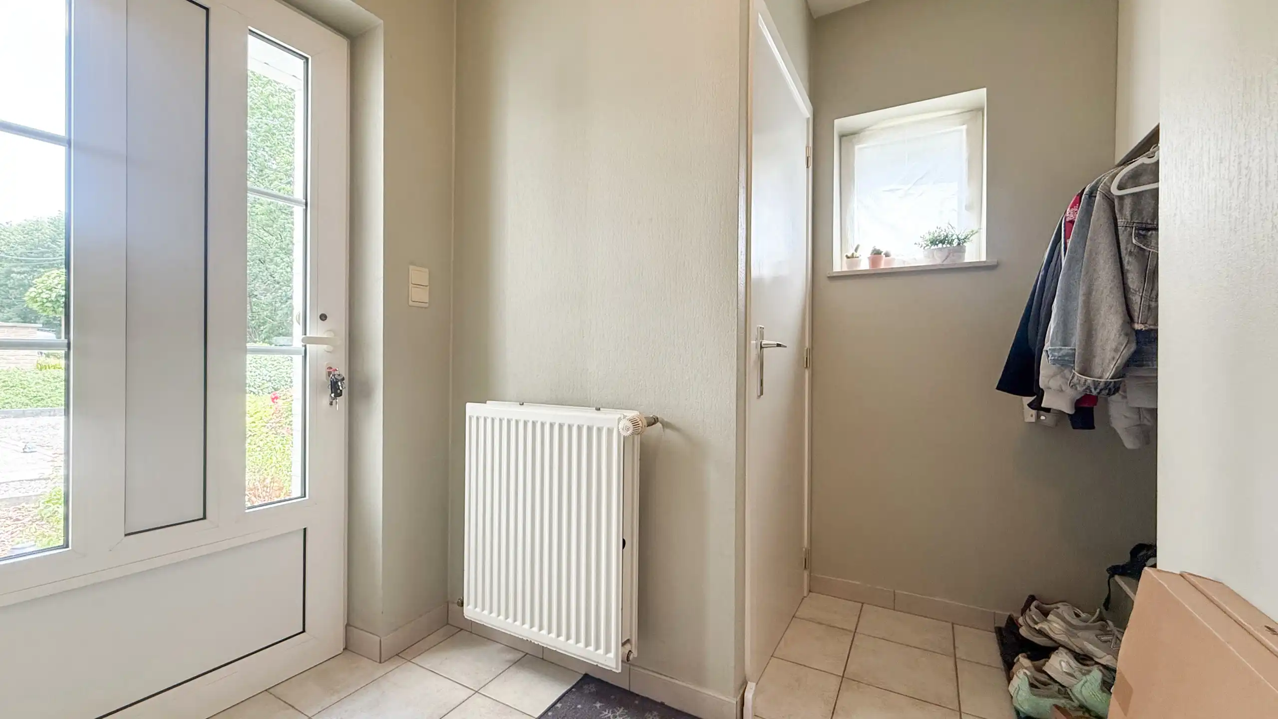 Gezellige instapklare starterswoning met 2 slpks en garage! foto 14
