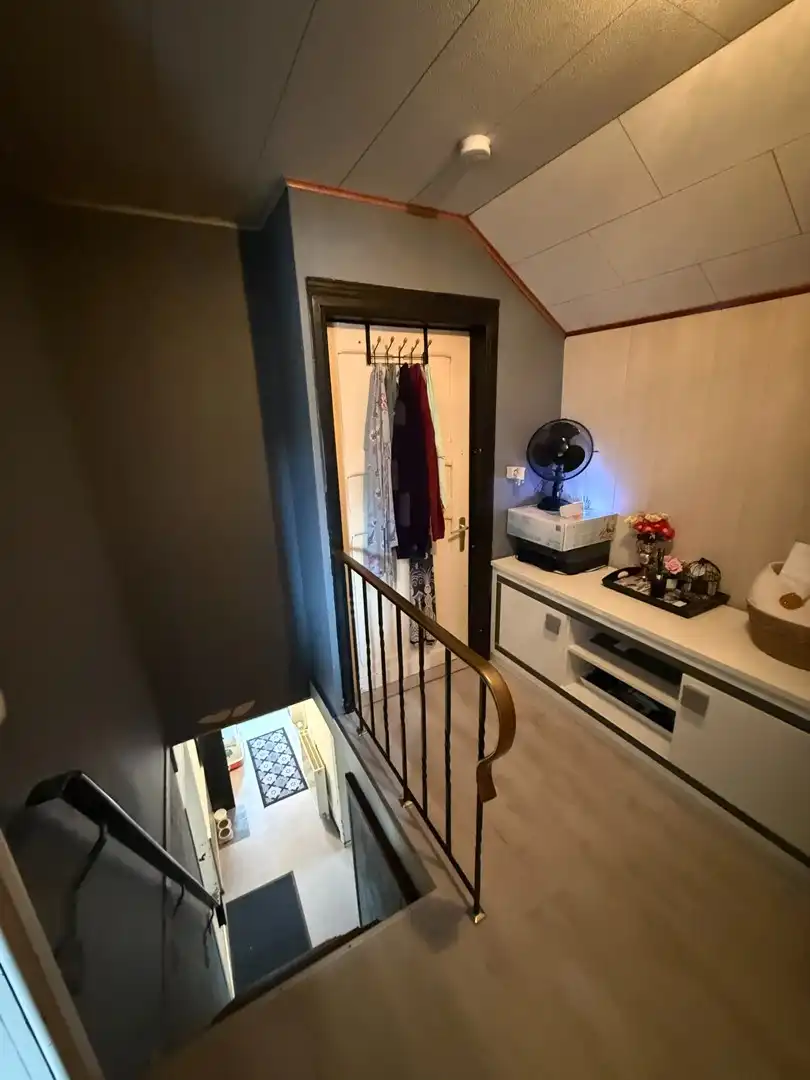 Opbrengsteigendom bestaande uit 2 halfopen woningen met garage en tuin te Hechtel. foto 32