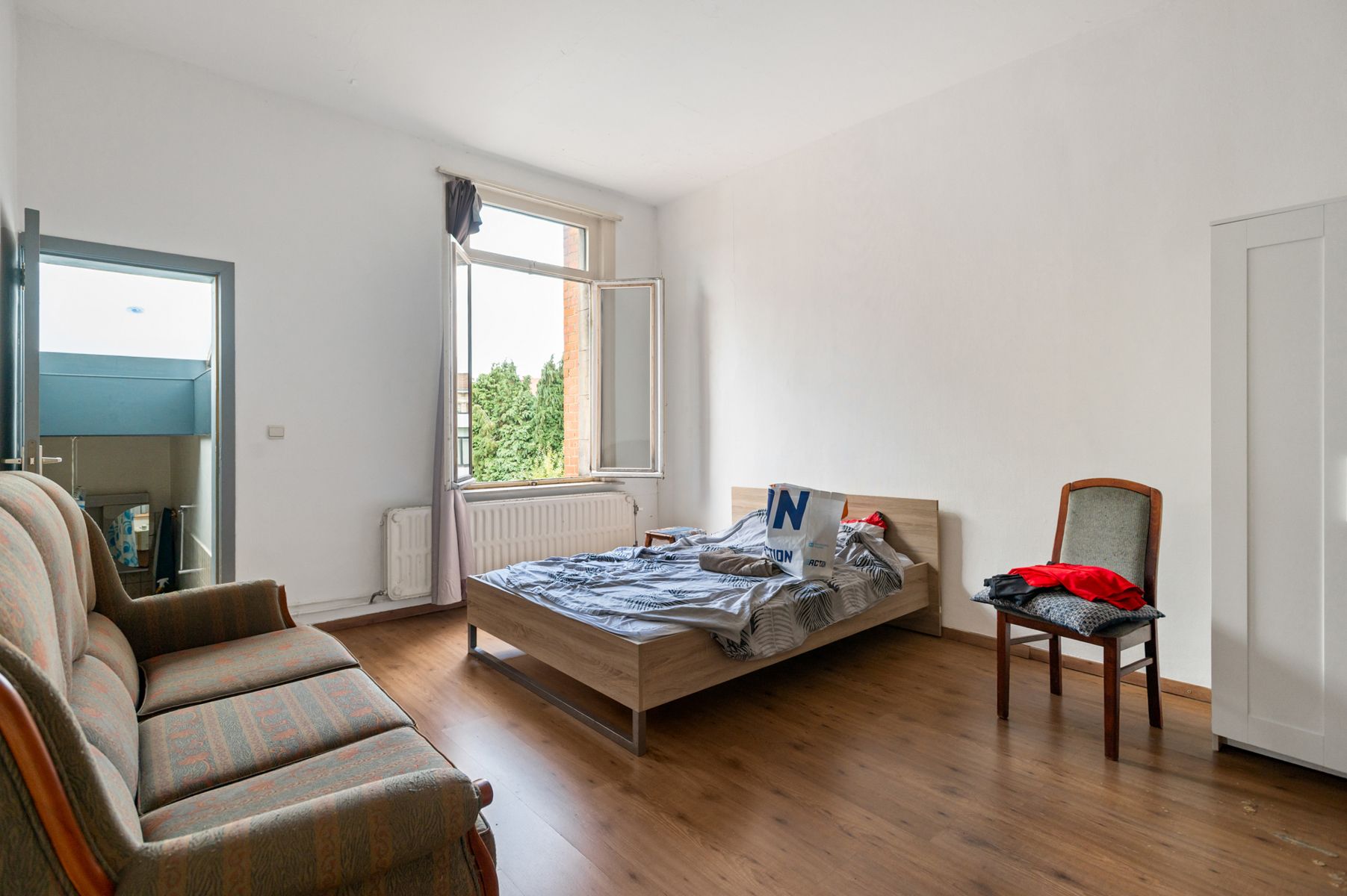 Handelshuis met tuin en stabiele huuropbrengst te koop foto 8