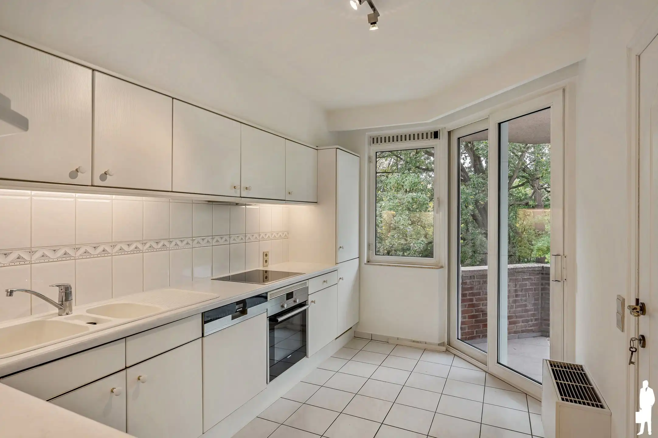 In het groen gelegen appartement van 100m2 met 2 slaapkamers, overdekt terras en parking foto 8