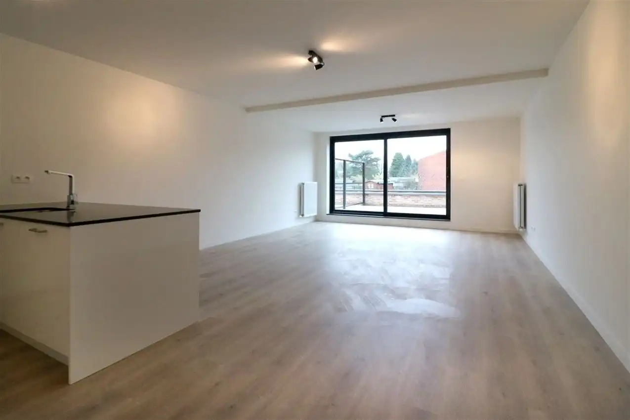 Gelijkvloers appartement met 2 slpk., terras en autostaanplaats foto 3