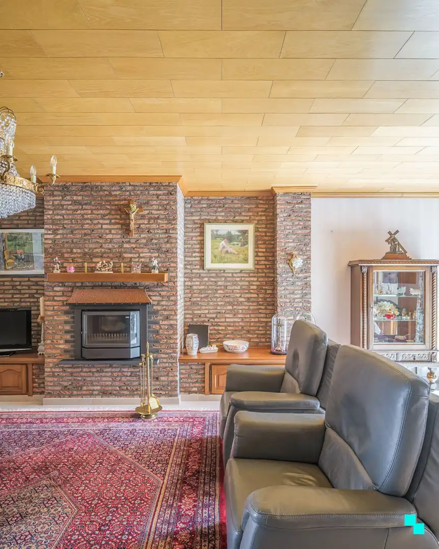 Strategisch gelegen woning met zonnige tuin en werkhuis foto 4