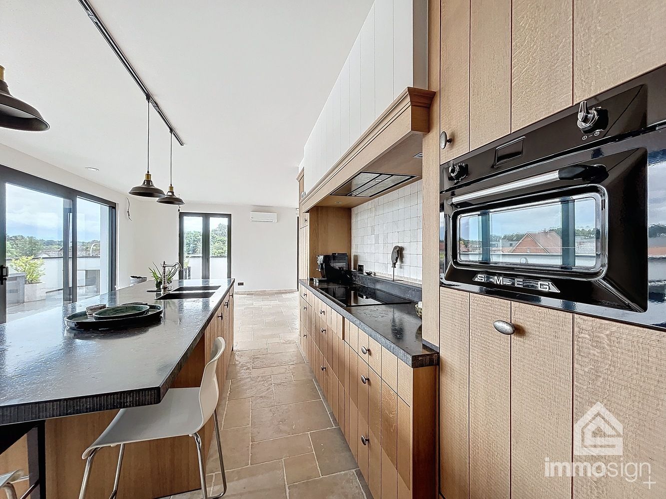 Hoogwaardig afgewerkt penthouse met zeer groot terras te Boekt! foto 6