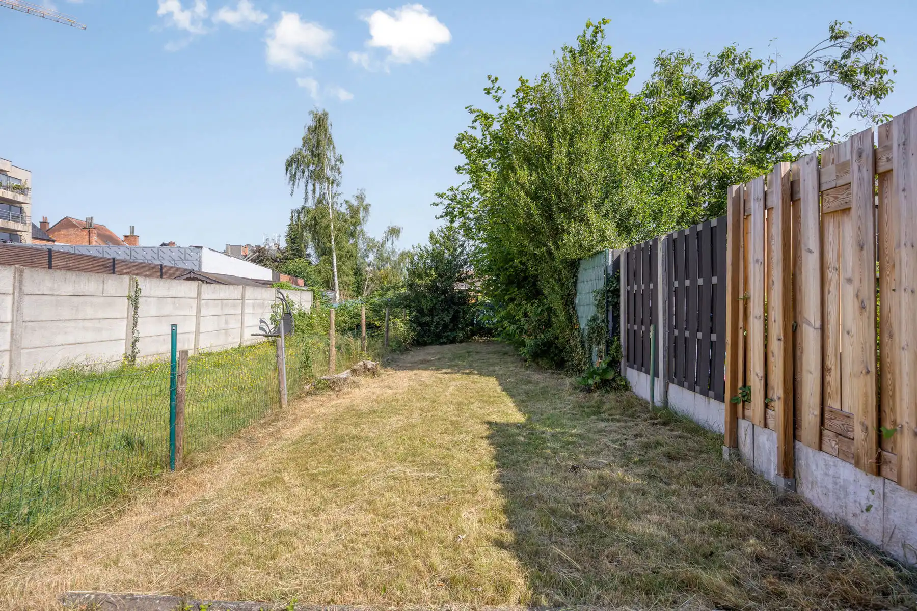 TE KOOP - gesloten bebouwing met 2 slaapkamers en tuin foto 15