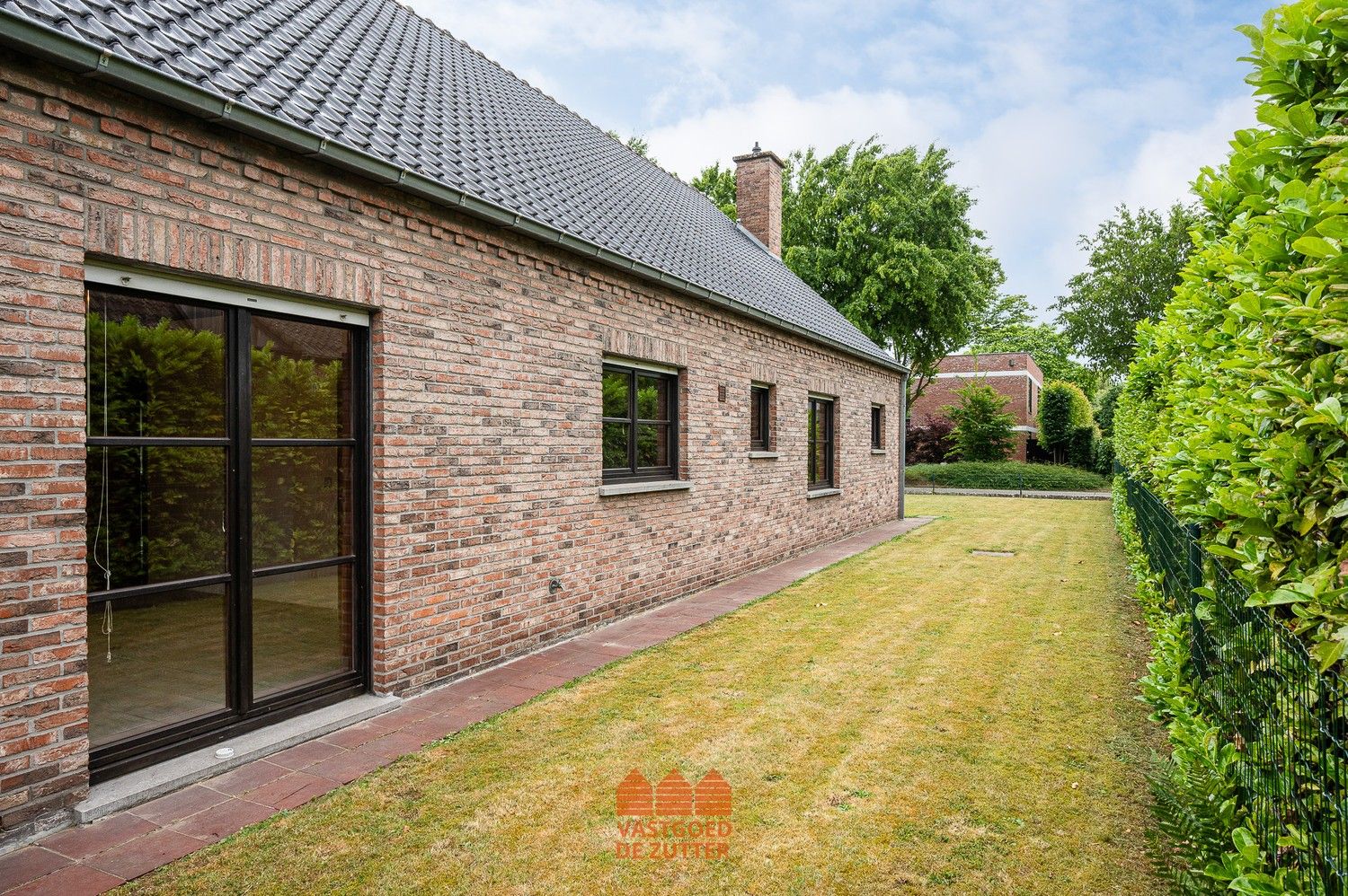 Ruime woning met potentieel en zuidgerichte tuin in doodlopende straat foto 12